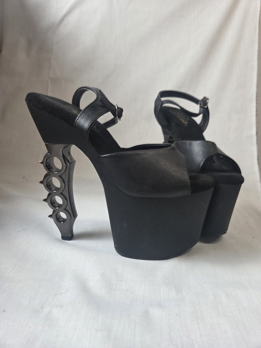 Pleaser Black Platform Peep-Toe Heels with Metallic Knuckle-Duster Heel Accent